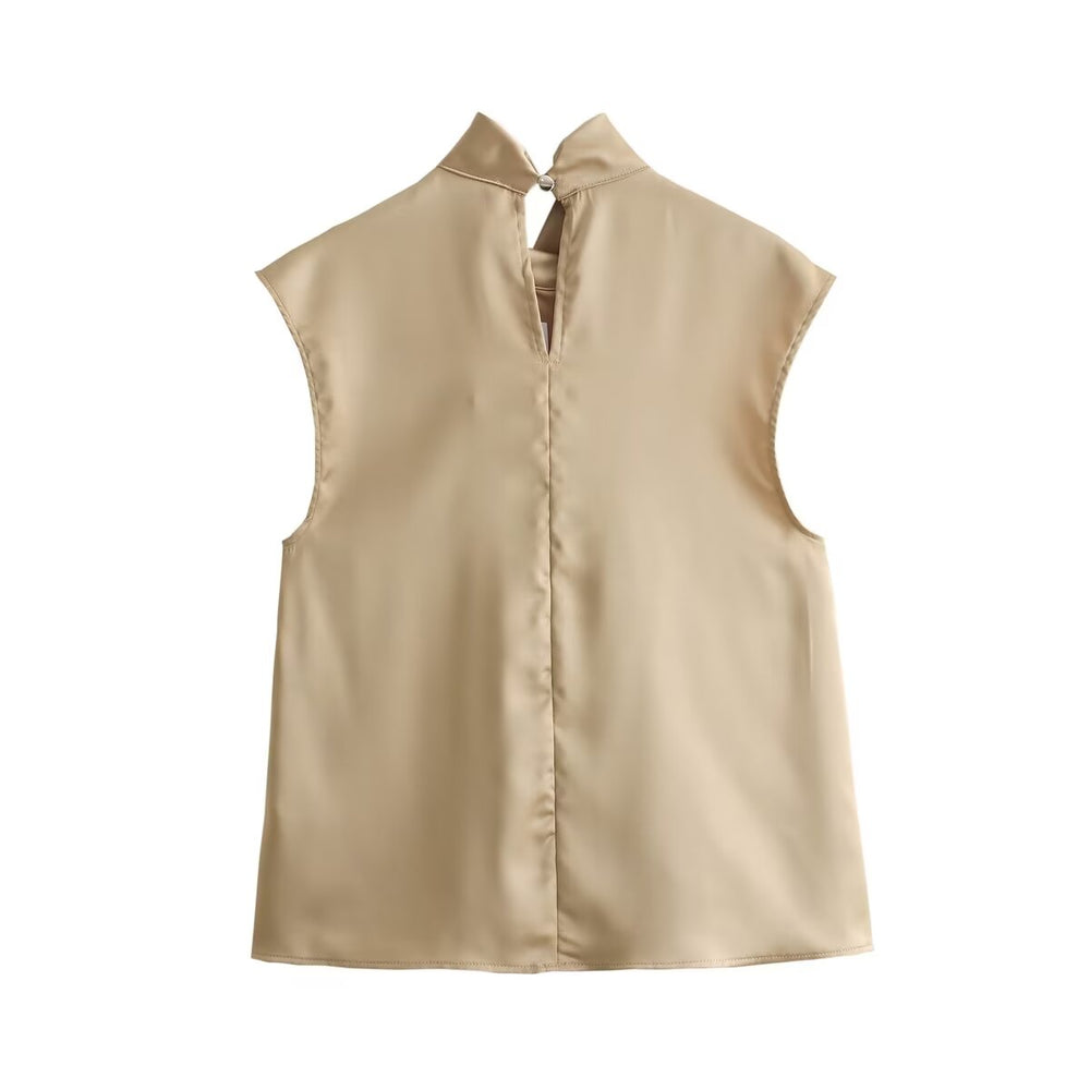 
                      
                        Sleeveless High Neck Blouse
                      
                    