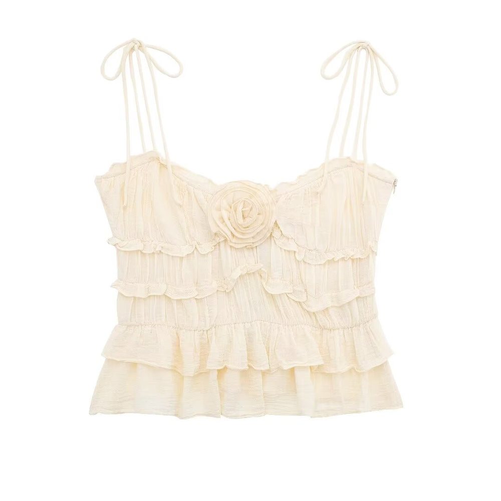 
                      
                        Ruffle Trim Spaghetti Strap Rosette Top
                      
                    