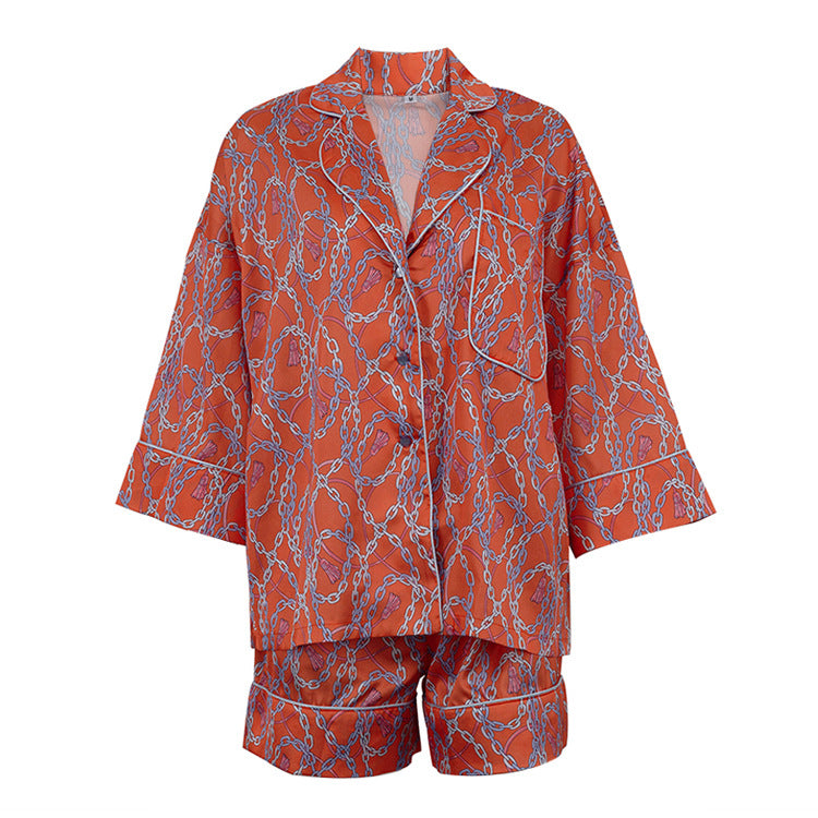 
                  
                    Print Three Quarter Length Sleeve Satin Top and Shorts Set
                  
                